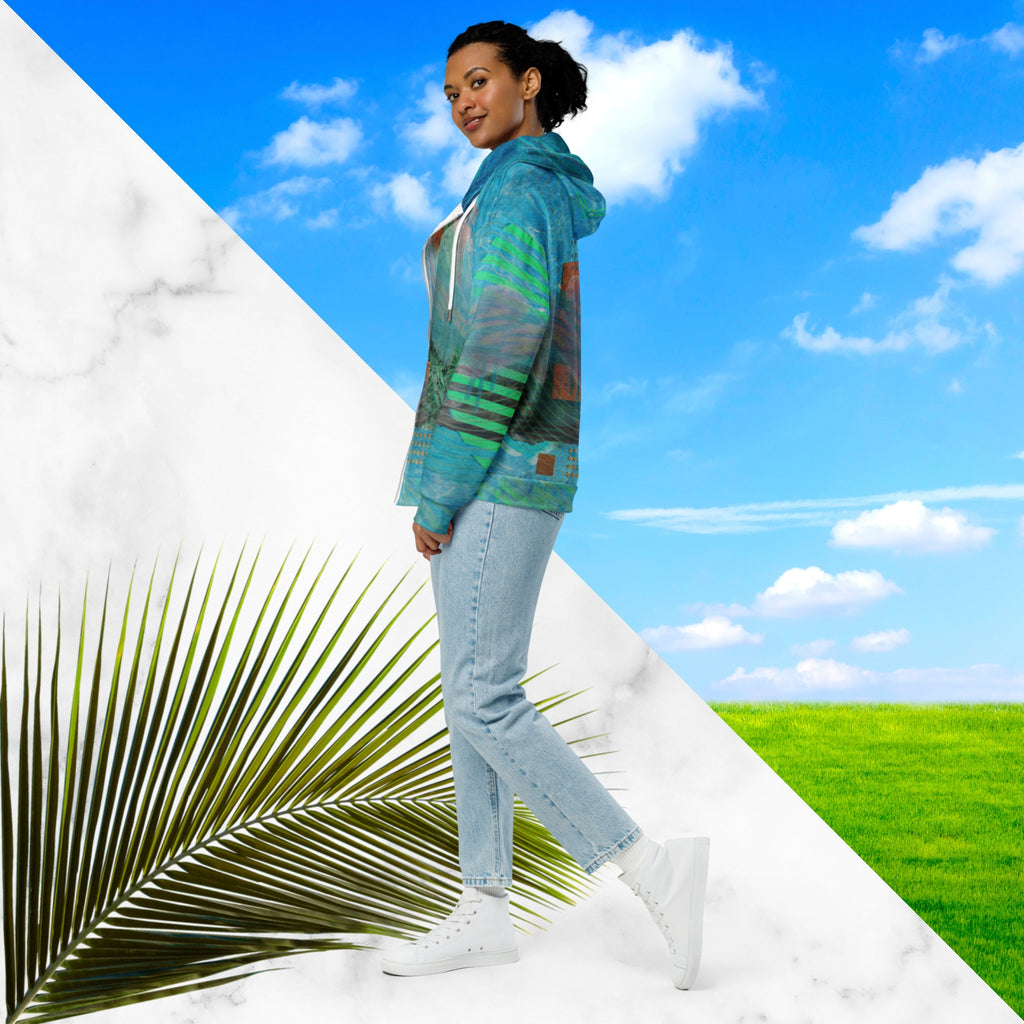Full color all over print zip hoodie with 90s retro abstract squiggles and blurred concentric rings on top of abstract shapes on top of tropical plants and rocks on top of blue pool water with a VHS distortion blur effect with Memphis design abstract shapes on the seams and hood