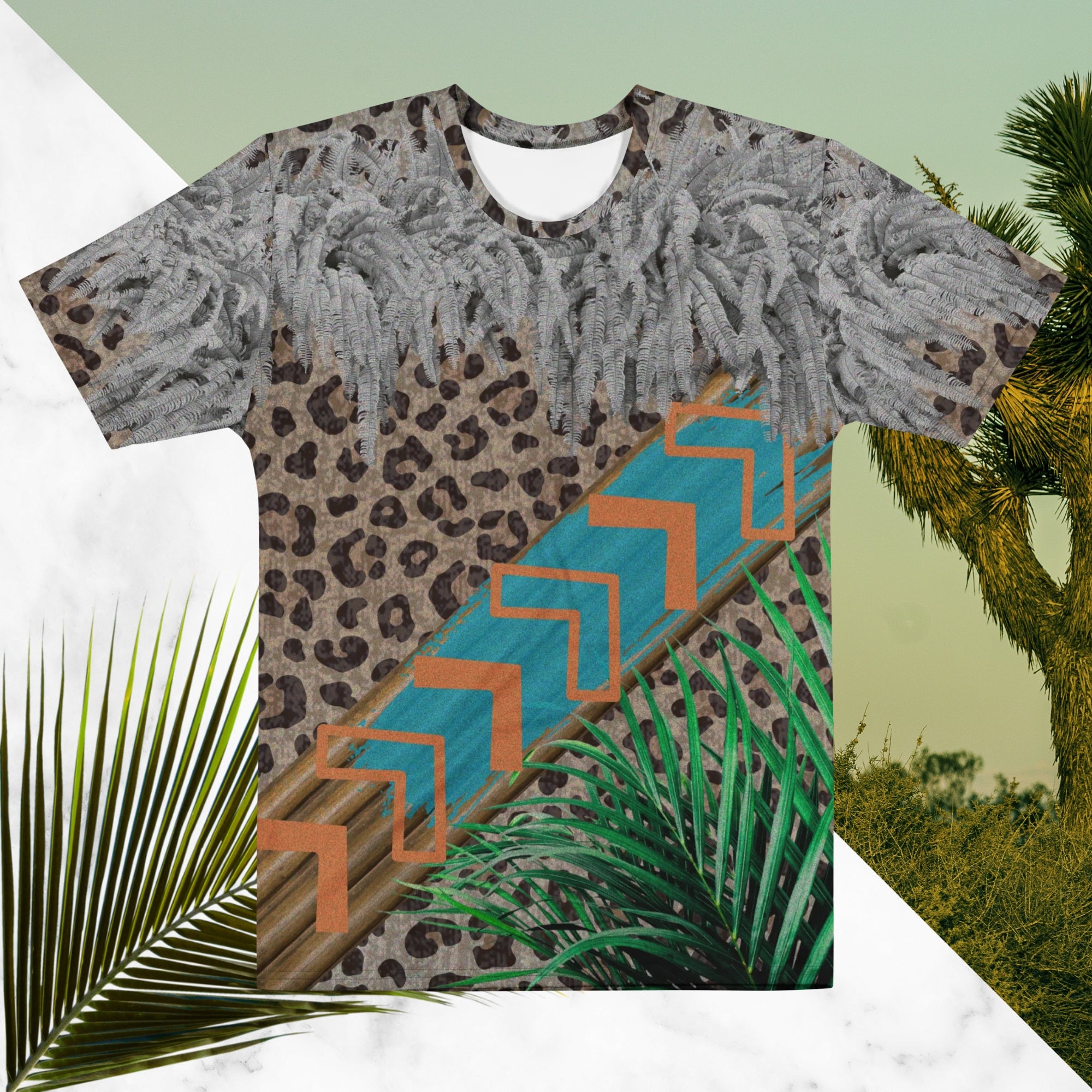Full color all over print graphic tee shirt with detailed leopard print background, diagonal wood slats from one corner to the other a bold sky blue brush stroke across the wood overlayed with neon orange solid and opaque Memphis Design style boomerang shapes at the top is an overhang of 3d detailed white fern leaves and a tropical plant in foreground