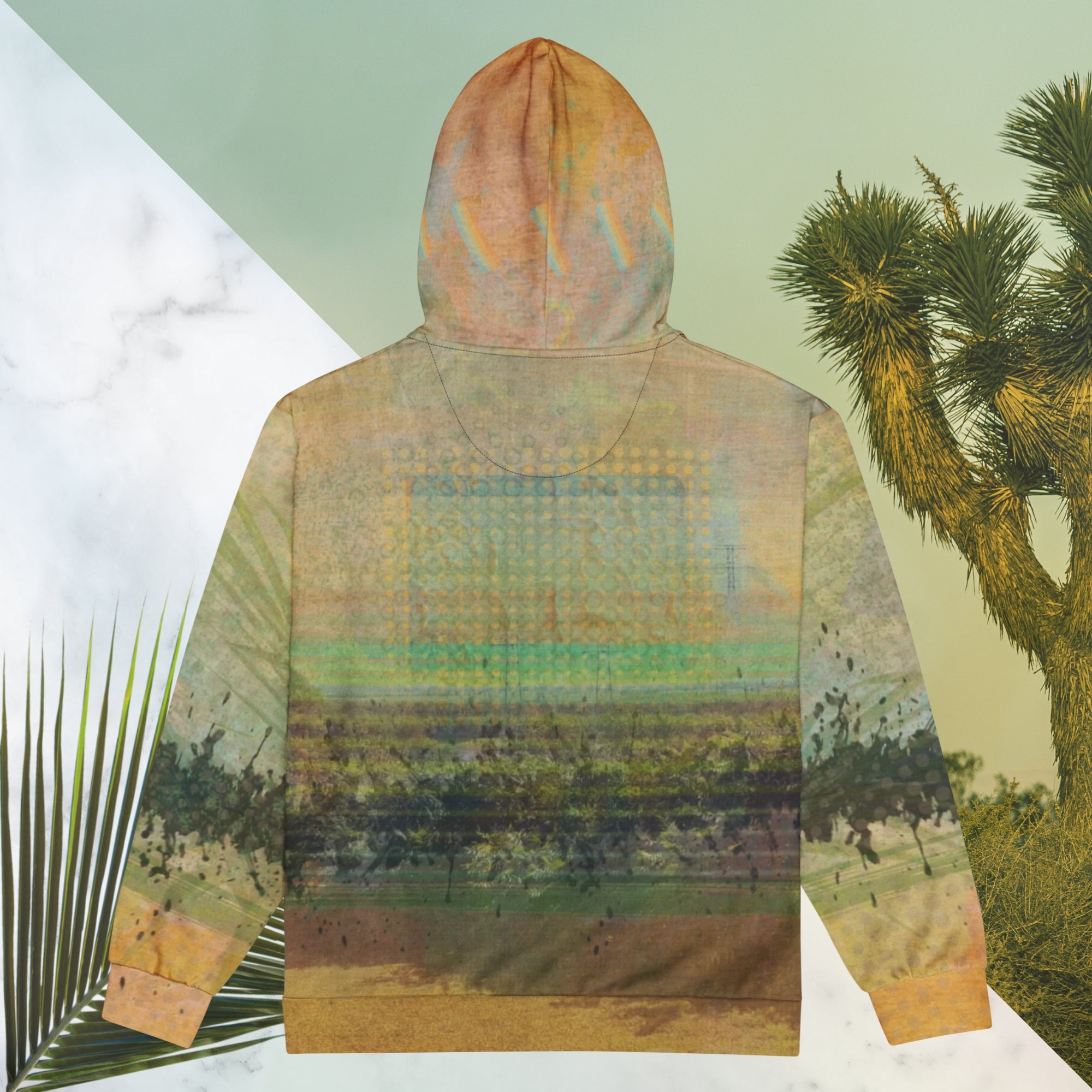 Multicolored primarily orange all over print zip hoodie depicting a long distance view of trees and power lines with vintage 90s style distortion abstract orange dot grids line patterns in shades of green and yellow black ink splotch lines and the background appearing as a painted canvas jungle plants and graphic lines overlayed on the sleeves