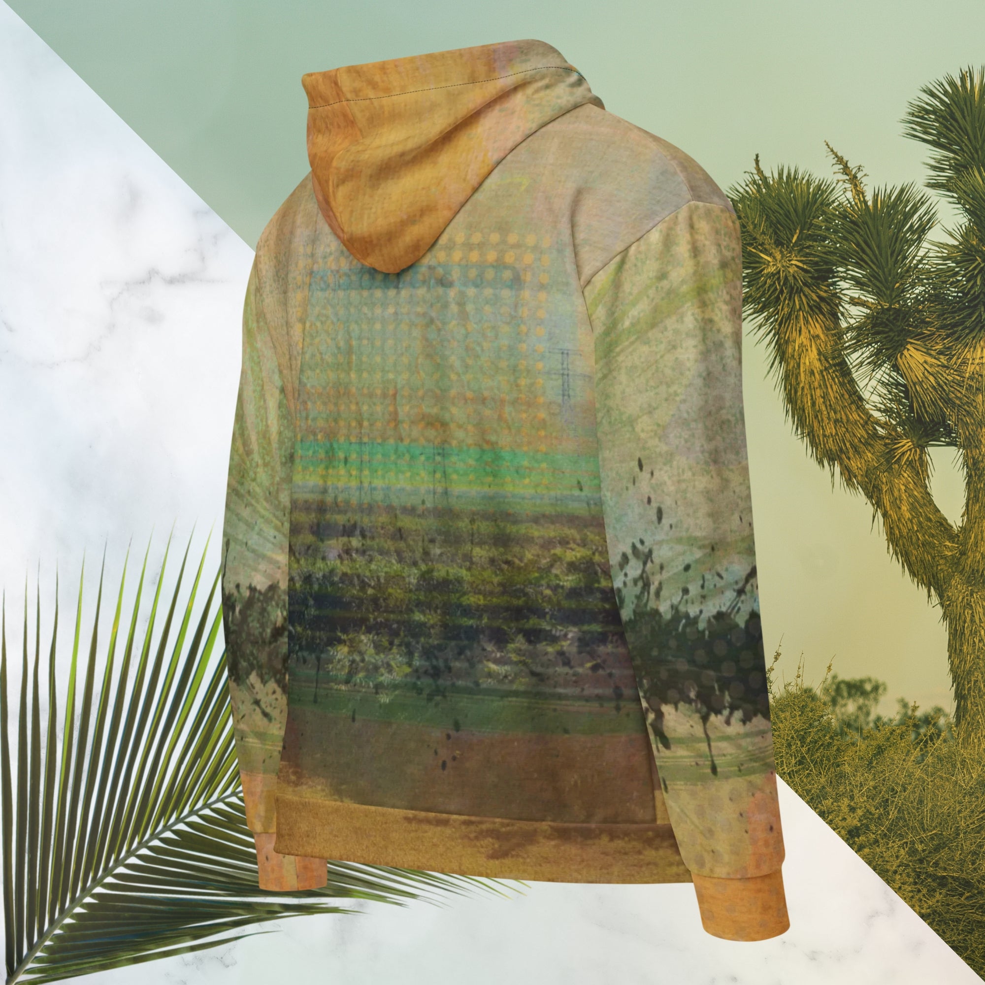 Multicolored primarily orange all over print zip hoodie depicting a long distance view of trees and power lines with vintage 90s style distortion abstract orange dot grids line patterns in shades of green and yellow black ink splotch lines and the background appearing as a painted canvas jungle plants and graphic lines overlayed on the sleeves