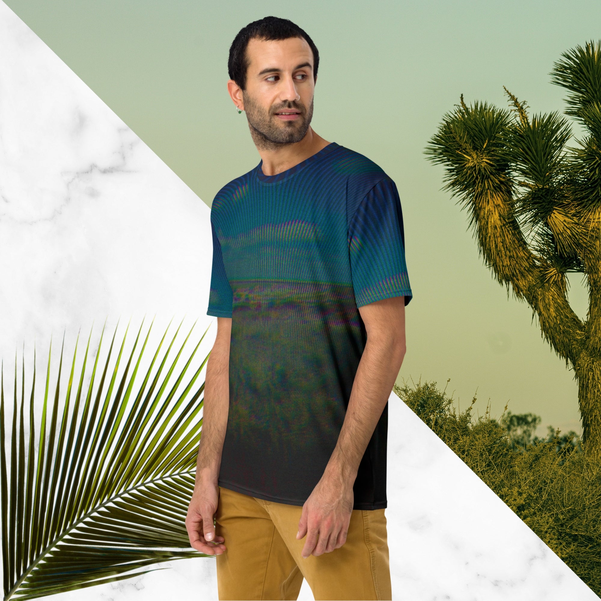 Full color all over print graphic tee shirt with image of a desert and green desert plants and blue sky with clouds above the horizon overlayed with rgb distortion and psychedelic lines graphics fanning outward towards the top