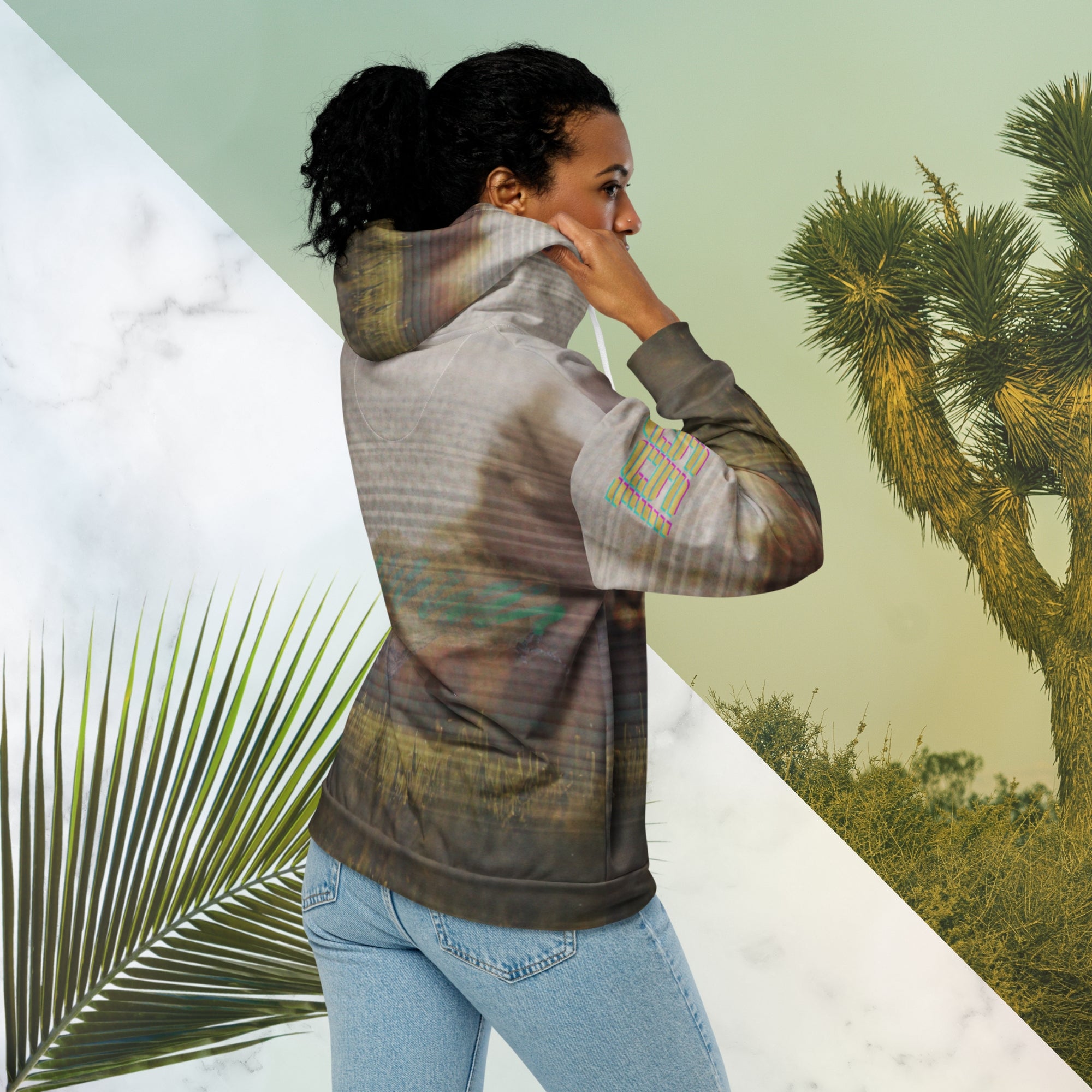 Multicolored all over print zip hoodie with full color 90s photo of sun setting through trees with grass in foreground overlayed with retro tv distortion and scan lines with grainy vhs effect transparent whit bars graphic in rhombus shape on left sleeve the numbers 1996 on right sleeve and left side of hood in retro 90s memphis font and retro jazz squiggle on back blending with colors