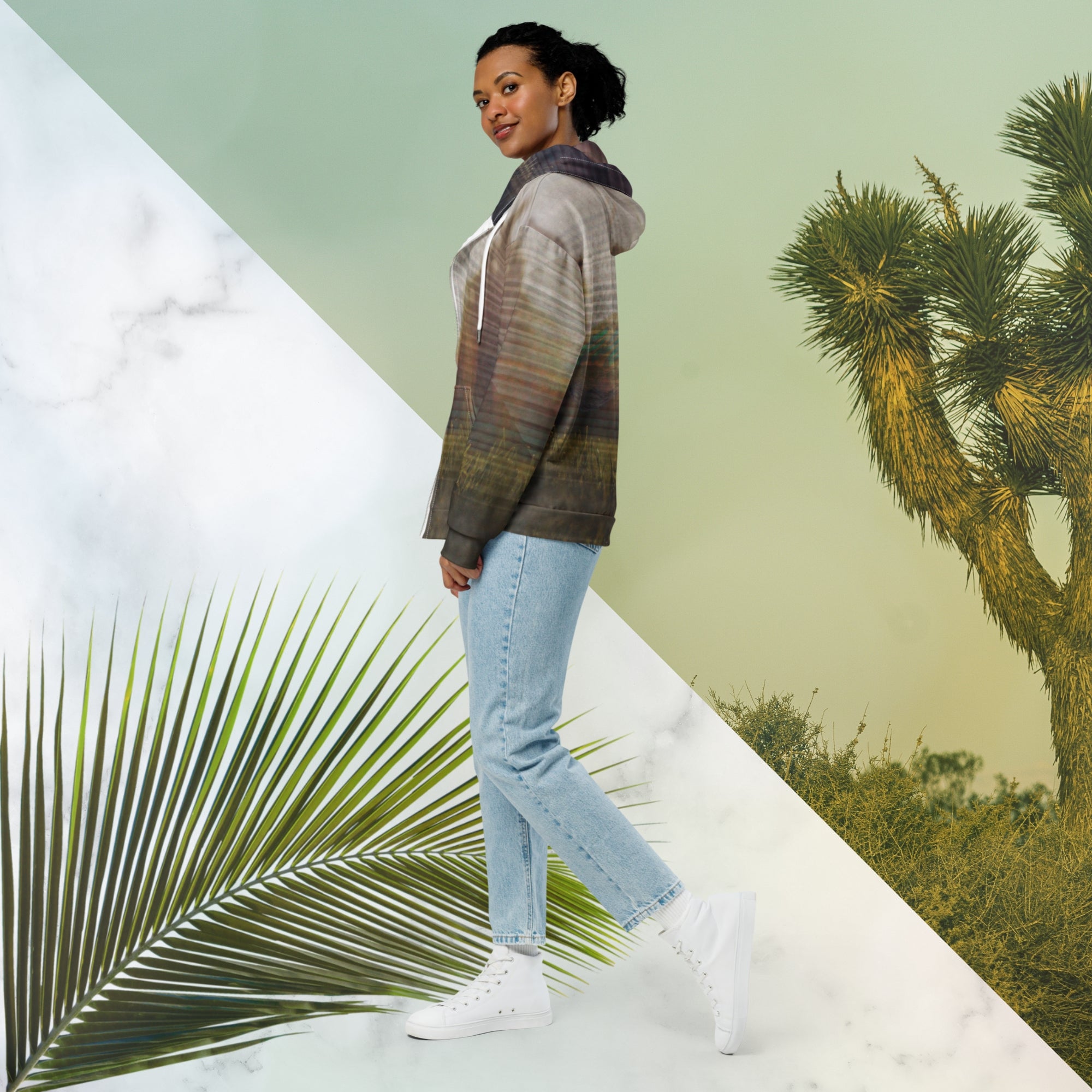 Multicolored all over print zip hoodie with full color 90s photo of sun setting through trees with grass in foreground overlayed with retro tv distortion and scan lines with grainy vhs effect transparent whit bars graphic in rhombus shape on left sleeve the numbers 1996 on right sleeve and left side of hood in retro 90s memphis font and retro jazz squiggle on back blending with colors