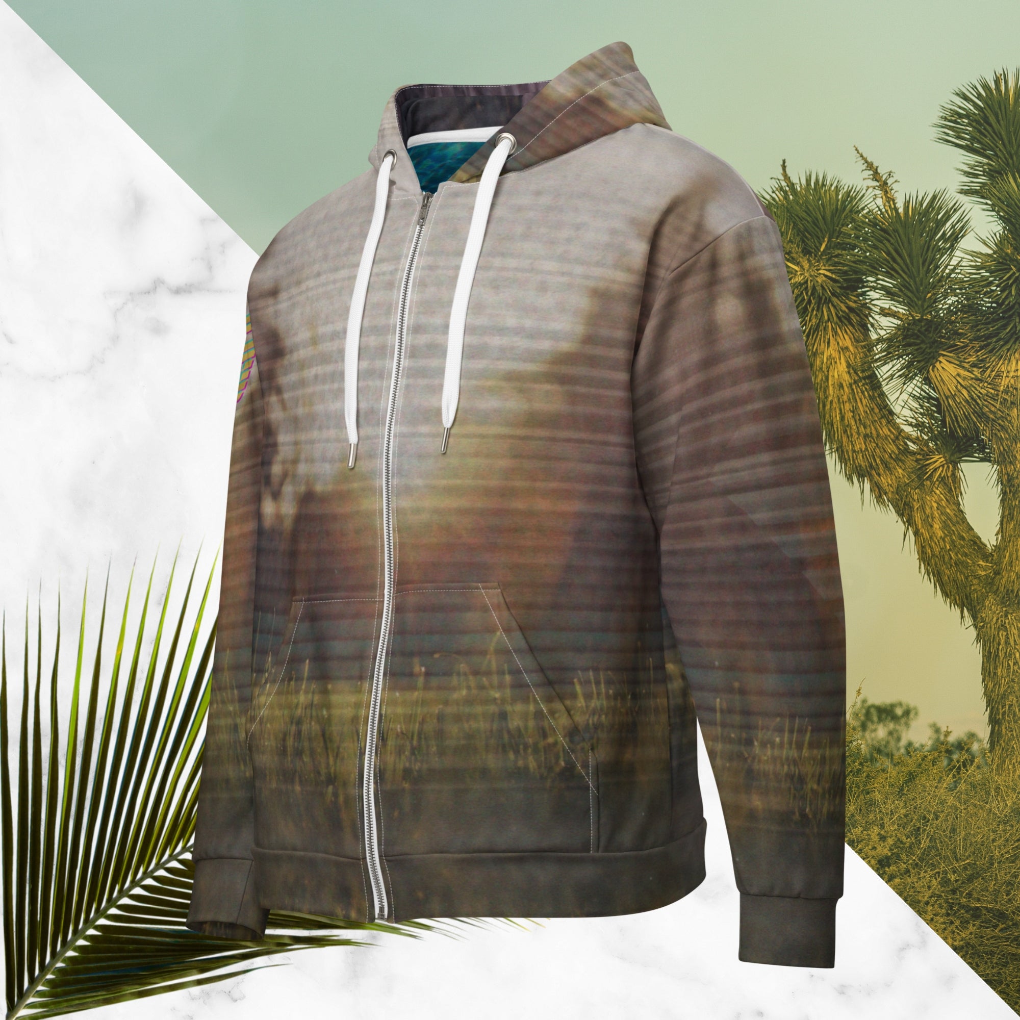 Multicolored all over print zip hoodie with full color 90s photo of sun setting through trees with grass in foreground overlayed with retro tv distortion and scan lines with grainy vhs effect transparent whit bars graphic in rhombus shape on left sleeve the numbers 1996 on right sleeve and left side of hood in retro 90s memphis font and retro jazz squiggle on back blending with colors