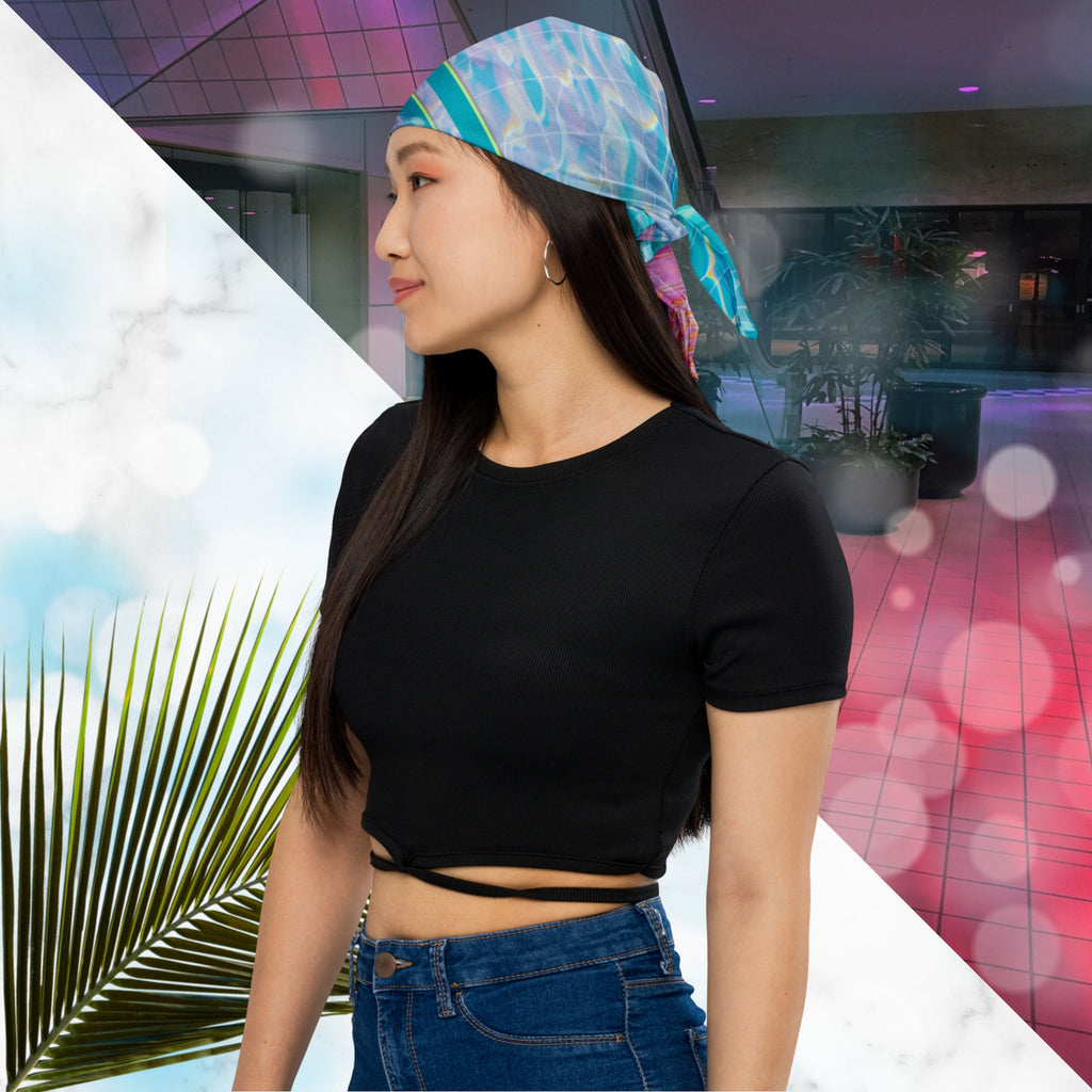 Full color all over print track jacket depicting blue water reflecting the colors of the sunset in oranges and pinks intensifying towards the top overlayed with a transparent thin white grid with tropical plant silhouettes of tropical plants creating stripe effects on sleeves with Neon Pools vaporwave sun emblem on left chest area