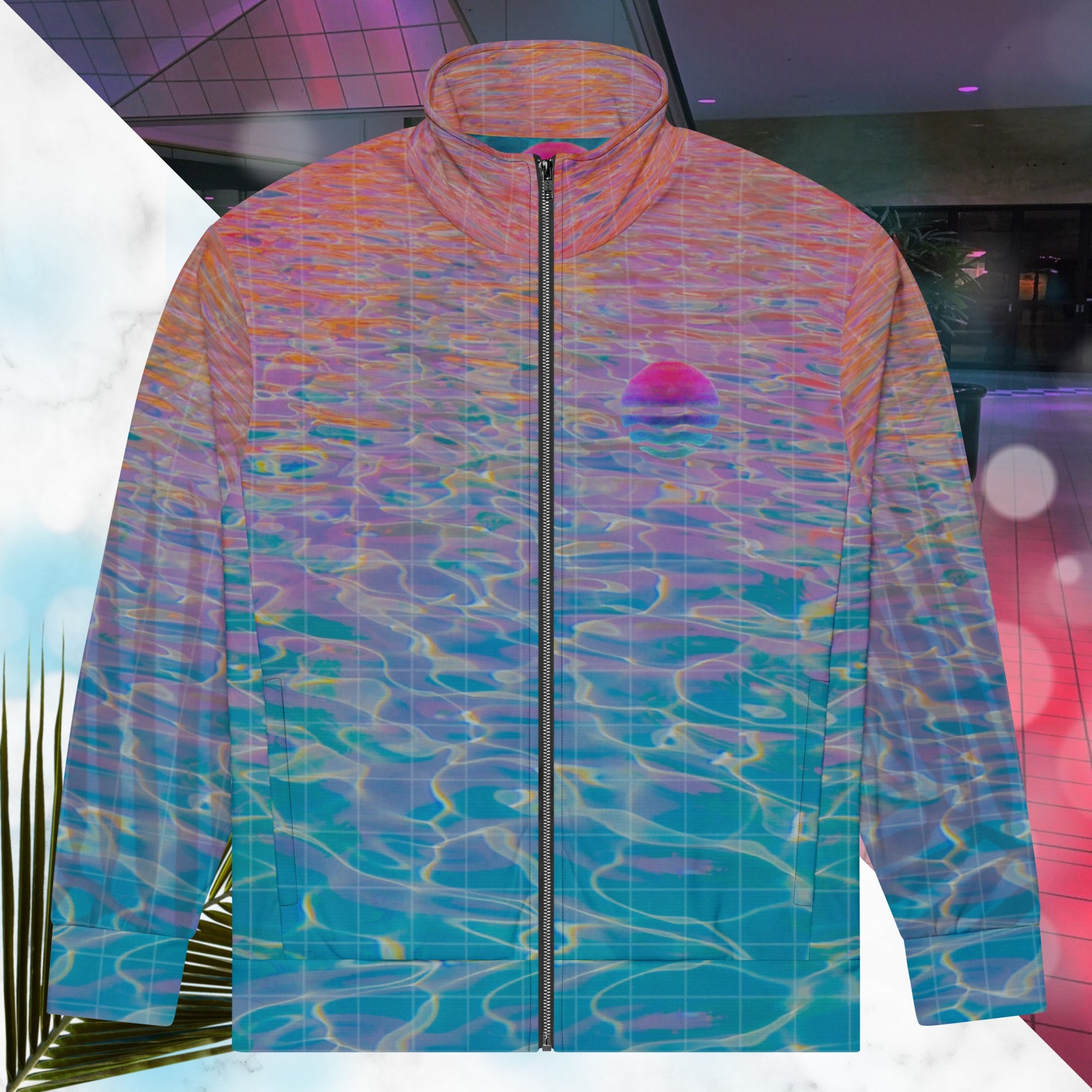 Multicolored all over print track jacket depicting blue water reflecting the colors of the sunset in oranges and pinks intensifying towards the top overlayed with a transparent thin white grid with tropical plant silhouettes of tropical plants creating stripe effects on sleeves with Neon Pools vaporwave sun emblem on left chest area