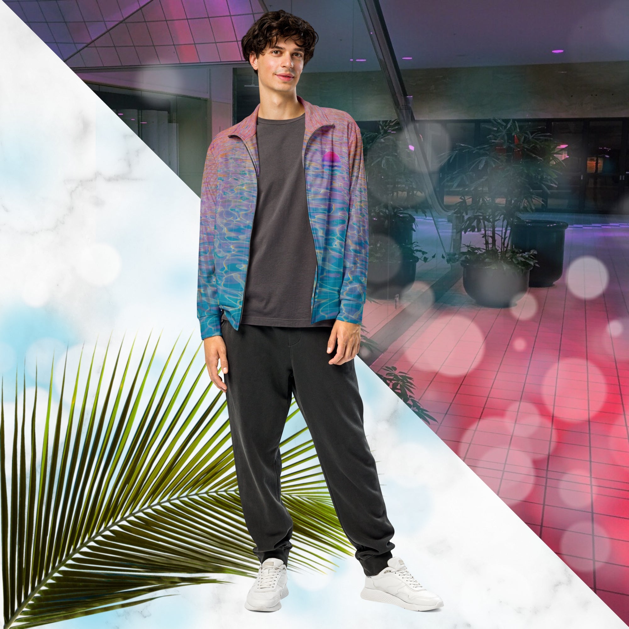Multicolored all over print track jacket depicting blue water reflecting the colors of the sunset in oranges and pinks intensifying towards the top overlayed with a transparent thin white grid with tropical plant silhouettes of tropical plants creating stripe effects on sleeves with Neon Pools vaporwave sun emblem on left chest area