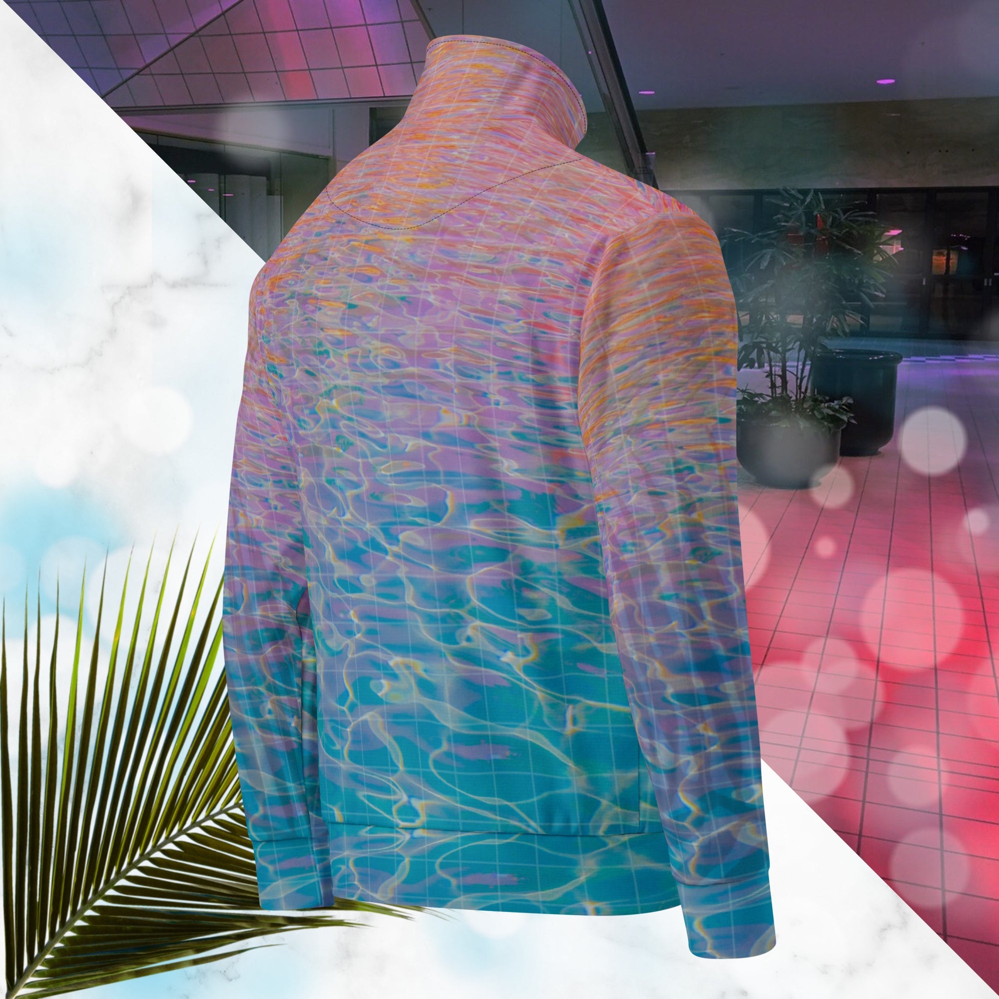 Multicolored all over print track jacket depicting blue water reflecting the colors of the sunset in oranges and pinks intensifying towards the top overlayed with a transparent thin white grid with tropical plant silhouettes of tropical plants creating stripe effects on sleeves with Neon Pools vaporwave sun emblem on left chest area