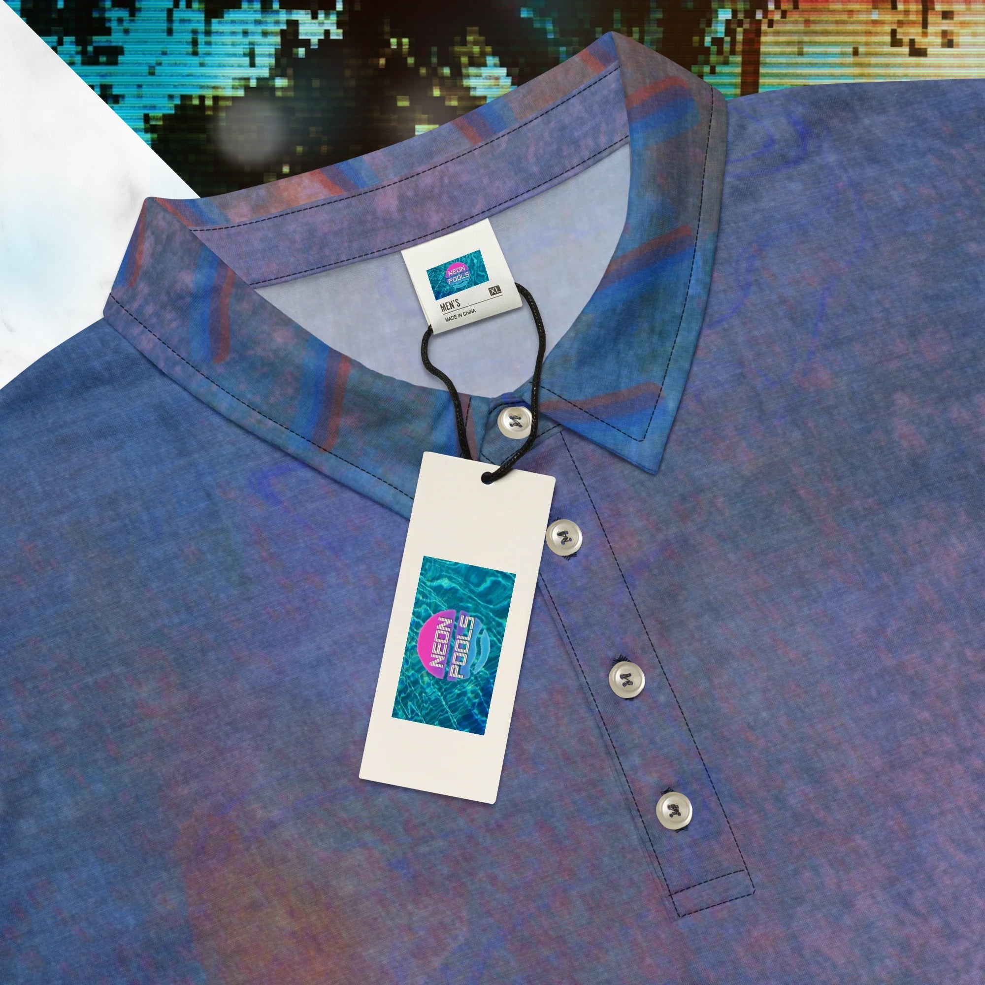 Close up of the collar and label with Neon Pools insignia on primarily blue all over print polo shirt with accents of orange and violet with an abstract pattern resembling a painted canvas viewed through an old CRT TV set with a and of out of focus slashes across the mid torso and around the sleeves