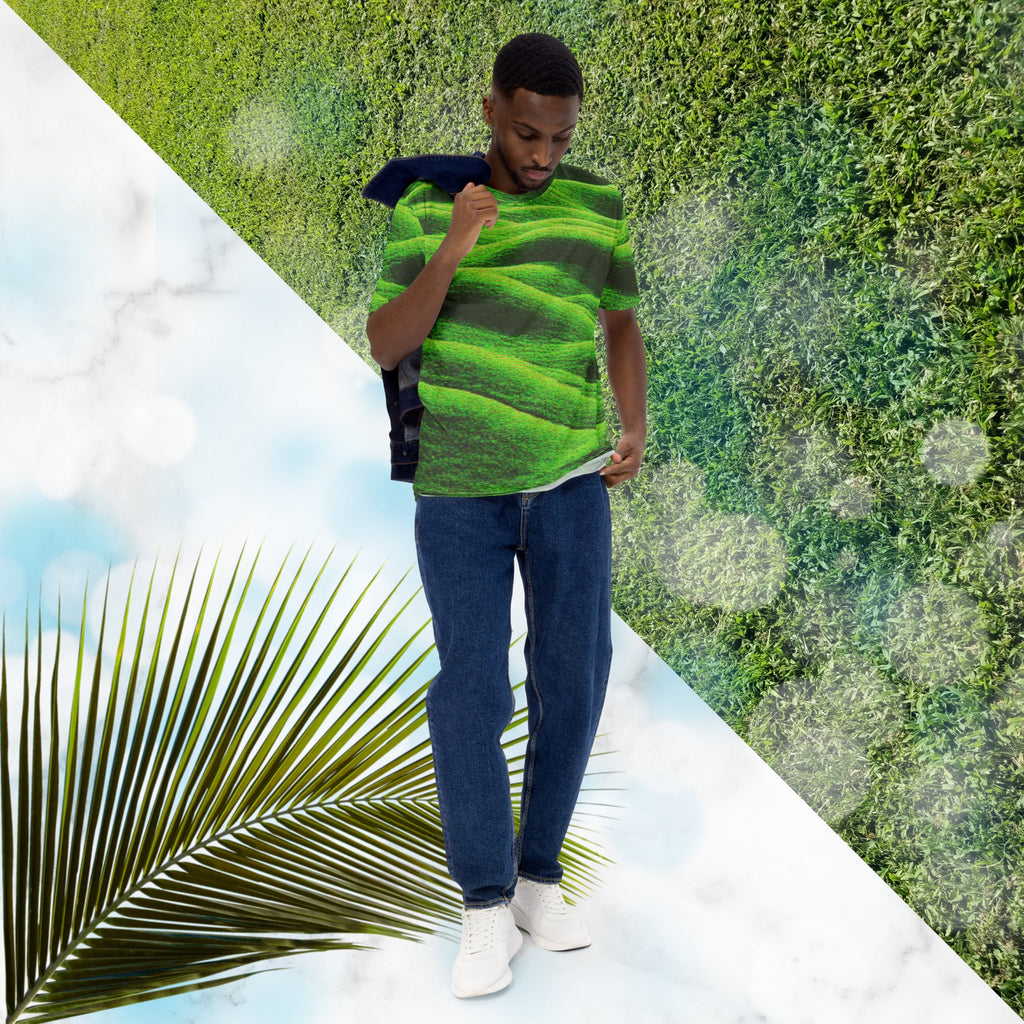 Green and black all over print graphic t-shirt depicting grass covered green rolling hills and their shadows overlayed with detailed v h s and retro t v distortion 