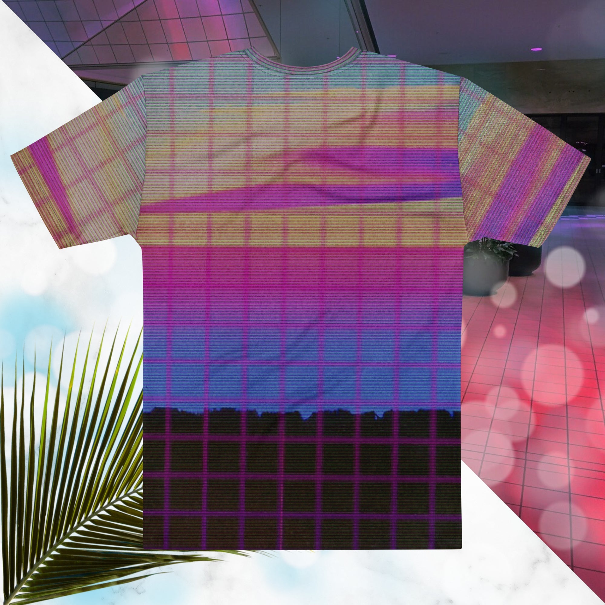 Multicolored all over print graphic t-shirt depicting a retro style grainy c g i image of a pink orange and yellow sunset with visible blue sky at the top sunset over pink to blue gradient water with a foreground of a black rocky cliff overlayed with a pink blurry grid and detailed v h s scanlines and distortion and a neon pools retro zigzag