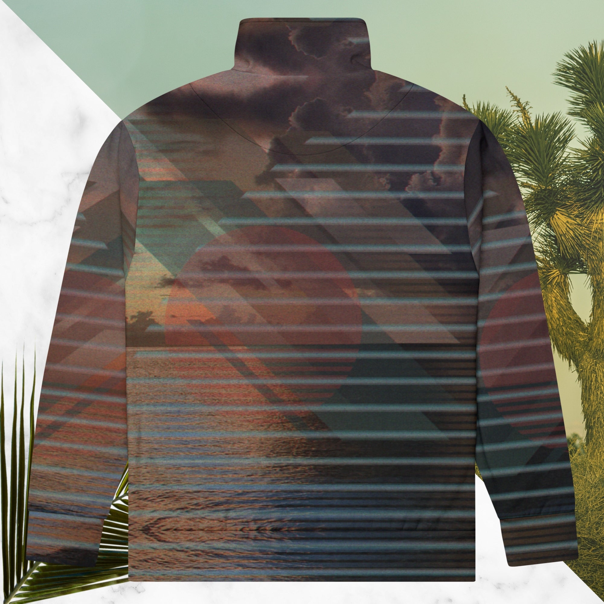Full color all over print track jacket with retro ocean sunset with shimmering water photo overlayed with transparent stripes and graphic shapes in a 1980s memphis design style partial stripes and a transparent vaporwave broken sun in coral tone neon pools broken sun and waves logo emblem at left chest