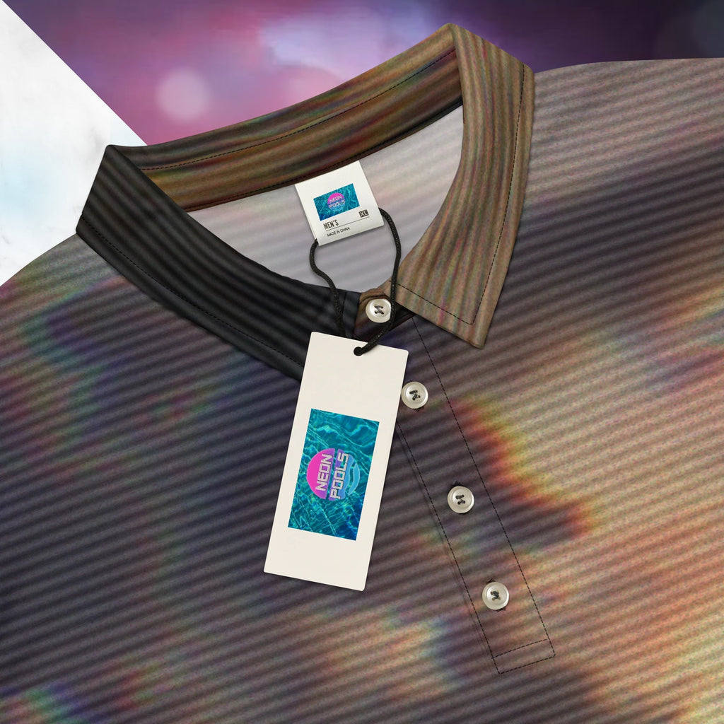 Closeup of the collar and label with Neon Pools insignia on multicolored all over print polo shirt depicting a sunset with an overall amber hue and grey clouds with RGB glow and distortion effects and scan lines blending with the image overlayed with a large Neon Pools abstract zigzag emblem fading from coral to violet to teal in a retro spray paint effect