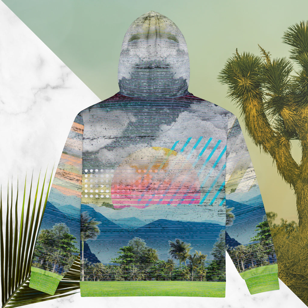 Colorful vaporwave and memphis design inspired all over print zip hoodie depicting a foreground of grass and palm trees with a backdrop of mountains more mountains and a sky filled with retro yellow orange salmon and red cascading bold zigzags tv scan lines turquoise dots and vaporwave broken sun on the back with clouds diagonal white stripes on right sleeve horizontal orange stripes on left sleeve
