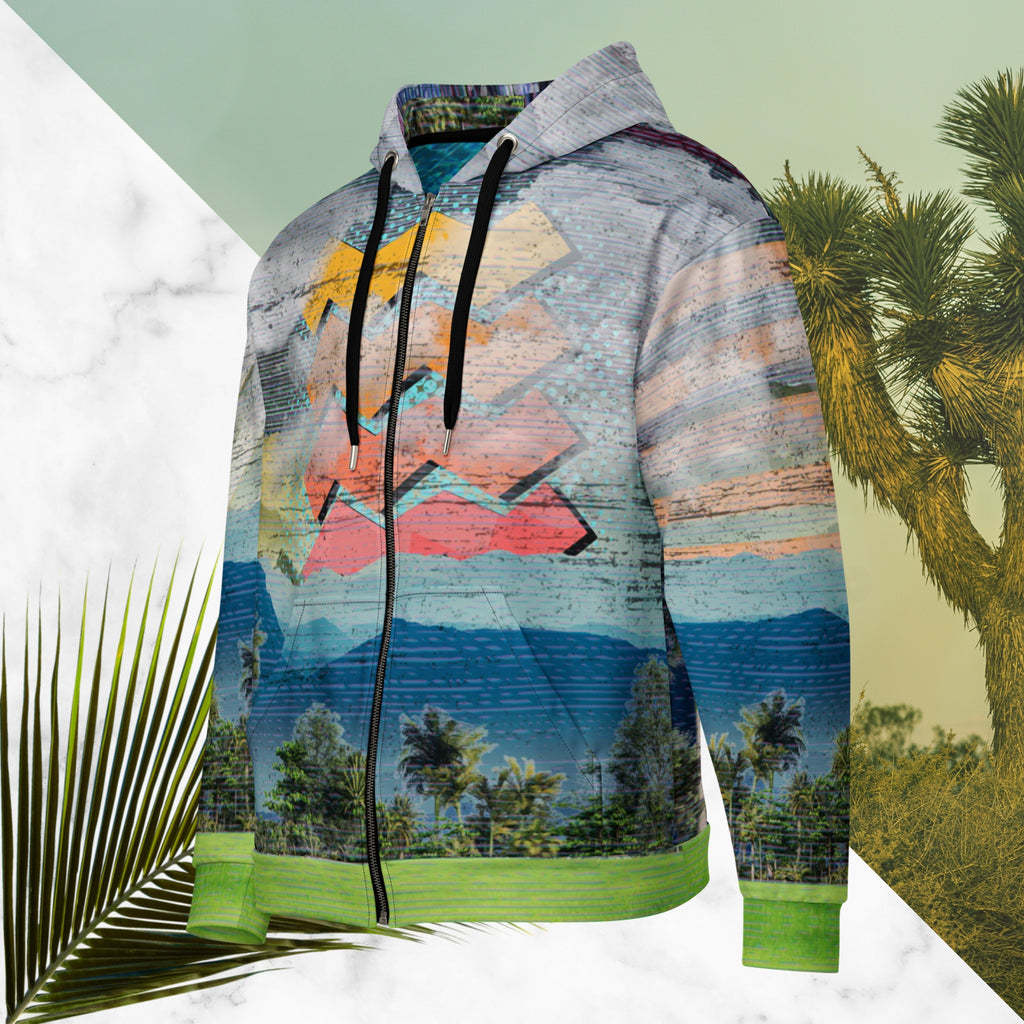 Colorful vaporwave and memphis design inspired all over print zip hoodie depicting a foreground of grass and palm trees with a backdrop of mountains more mountains and a sky filled with retro yellow orange salmon and red cascading bold zigzags tv scan lines turquoise dots and vaporwave broken sun on the back with clouds diagonal white stripes on right sleeve horizontal orange stripes on left sleeve