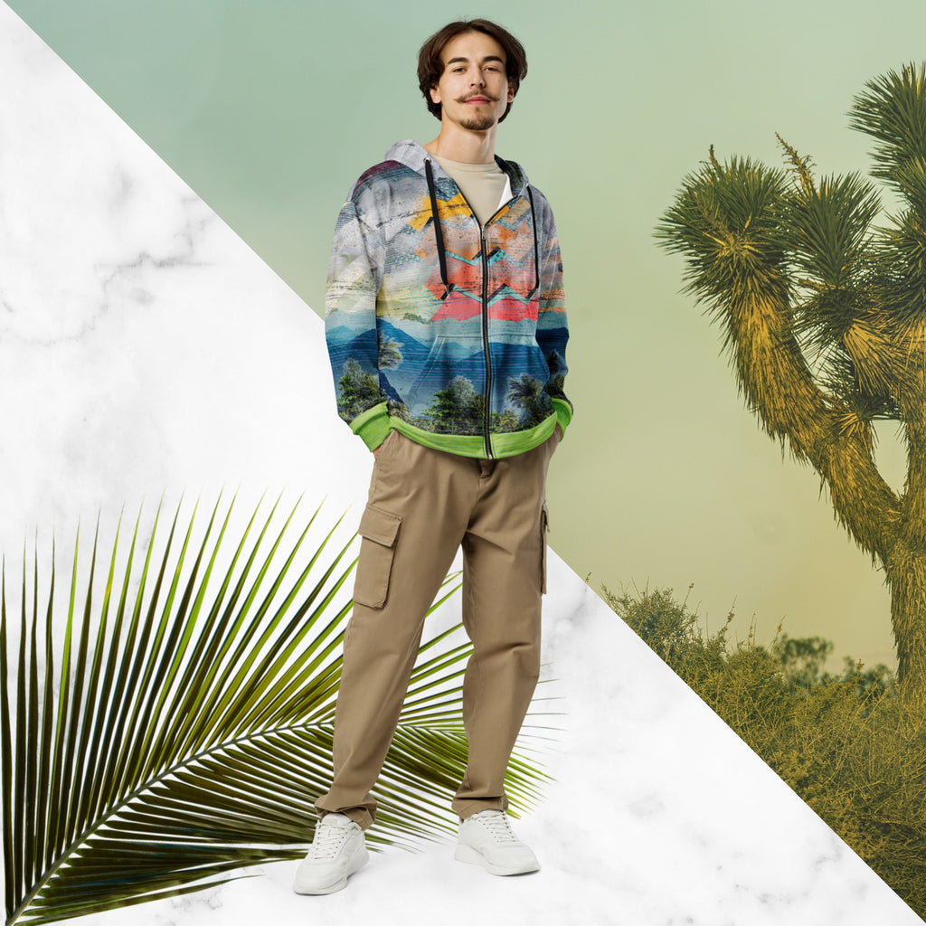 Colorful vaporwave and memphis design inspired all over print zip hoodie depicting a foreground of grass and palm trees with a backdrop of mountains more mountains and a sky filled with retro yellow orange salmon and red cascading bold zigzags tv scan lines turquoise dots and vaporwave broken sun on the back with clouds diagonal white stripes on right sleeve horizontal orange stripes on left sleeve