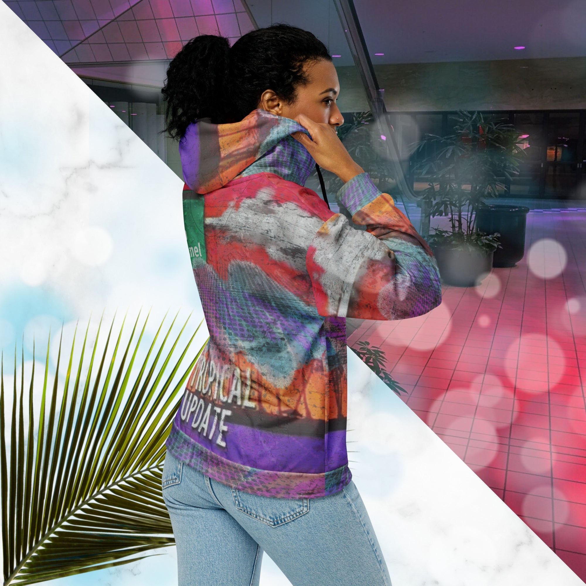 Vibrant multicolored all over print zip hoodie with retro tv weather broadcast graphics featuring a logo that says The Neon Channel and the words tropical update teal and purple retro zigzag tropical sunset in brilliant oranges and reds with clouds 90s distortion blue dots graphics