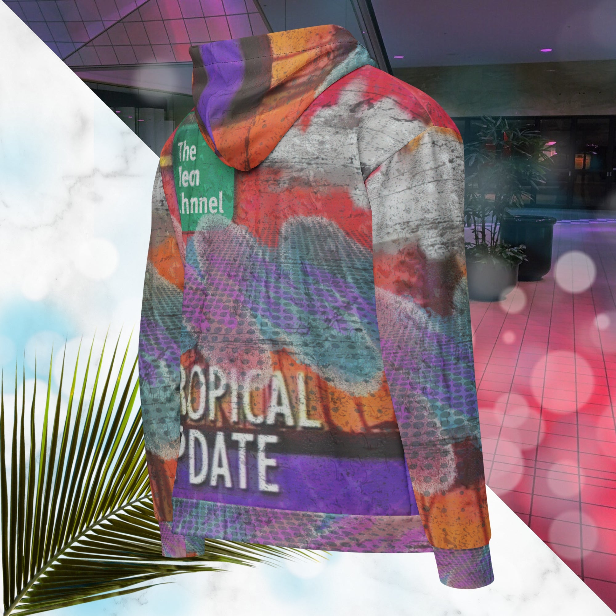 Vibrant multicolored all over print zip hoodie with retro tv weather broadcast graphics featuring a logo that says The Neon Channel and the words tropical update teal and purple retro zigzag tropical sunset in brilliant oranges and reds with clouds 90s distortion blue dots graphics