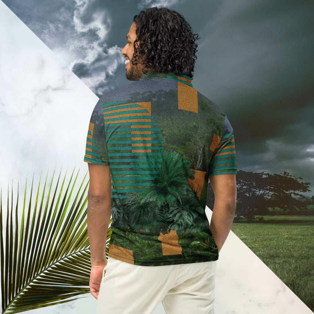 Primarily green orange teal and misty blue shirt depicting a dense lush misty jungle overlayed and interlaced with 3d ferns monstera plants and bold solid orange abstract graphic shapes bold teal rounded modern stripes and a dark gray stormy sky at the top overlayed with retro inspired static similar to video degradation on an old tv set