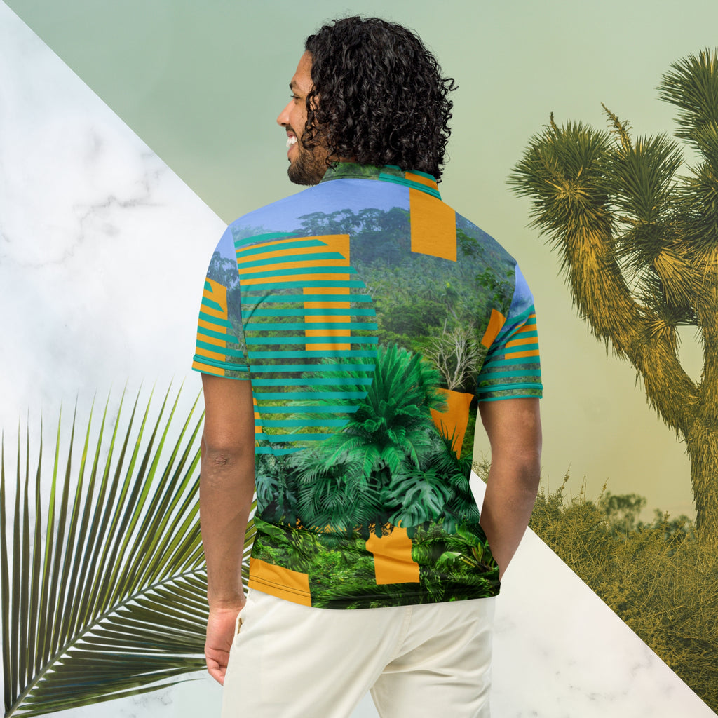 Primarily green orange teal and misty blue shirt depicting a dense lush misty jungle overlayed and interlaced with 3d ferns monstera plants and bold solid orange abstract graphic shapes bold teal rounded modern stripes and a hazy blue sky at the top