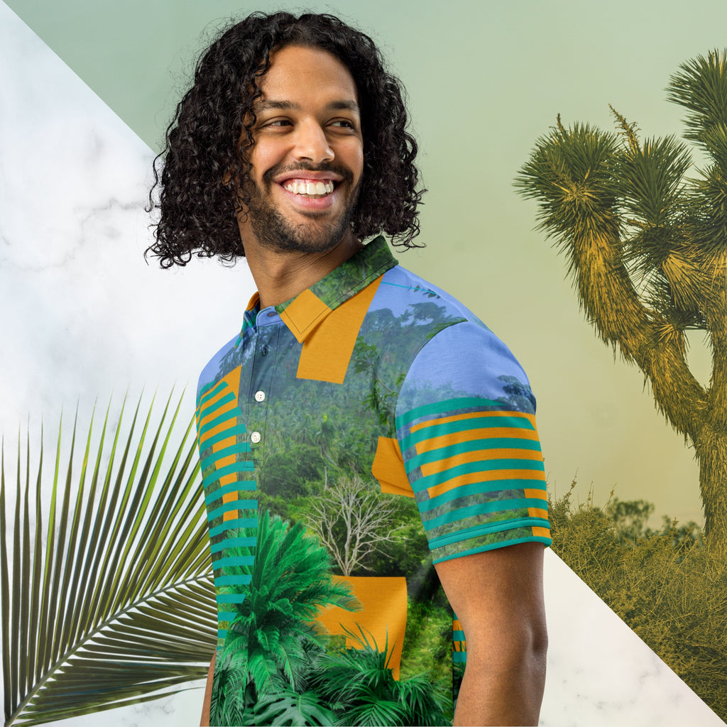 Primarily green orange teal and misty blue shirt depicting a dense lush misty jungle overlayed and interlaced with 3d ferns monstera plants and bold solid orange abstract graphic shapes bold teal rounded modern stripes and a hazy blue sky at the top